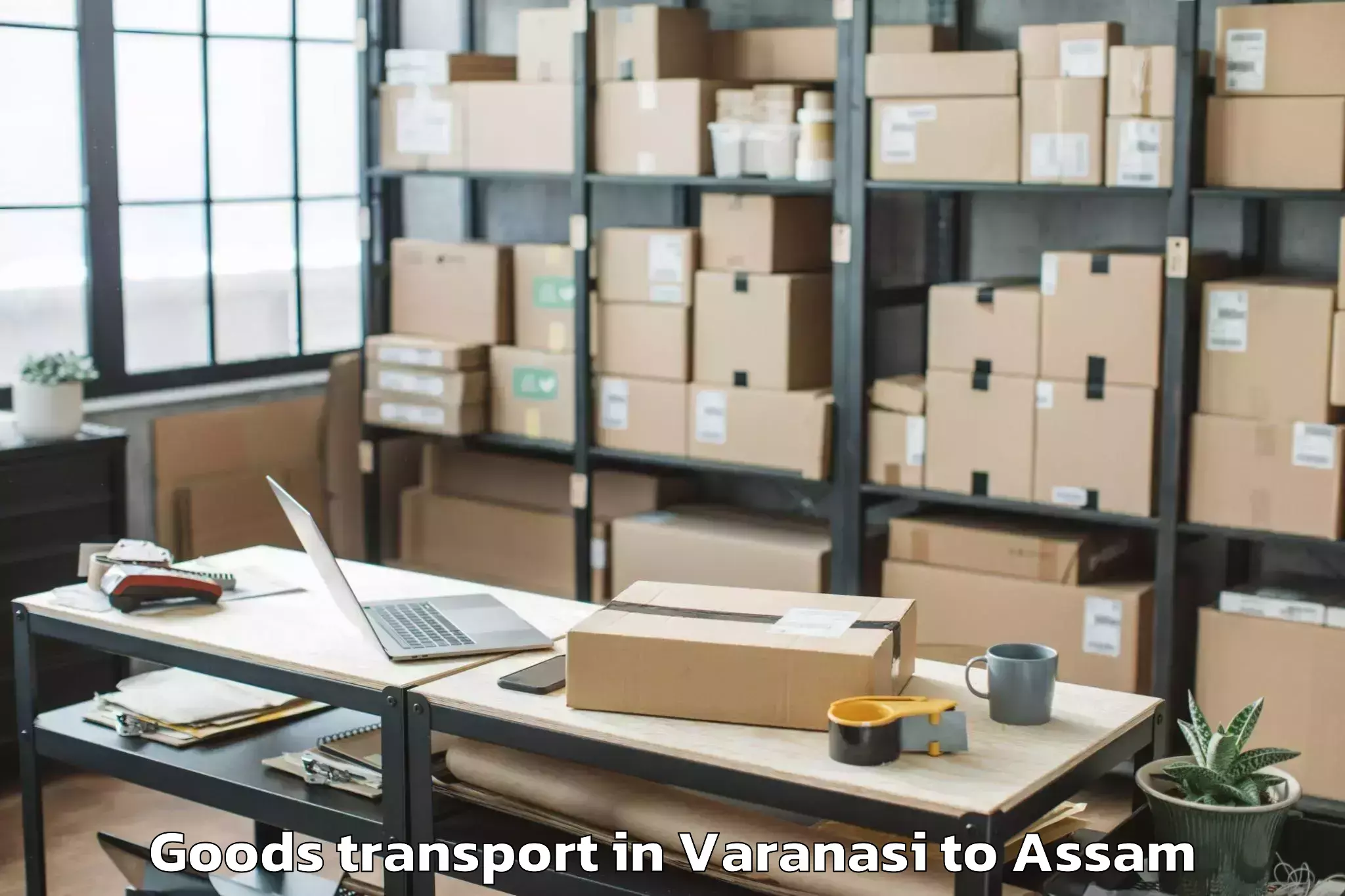 Varanasi to Demow Goods Transport Booking